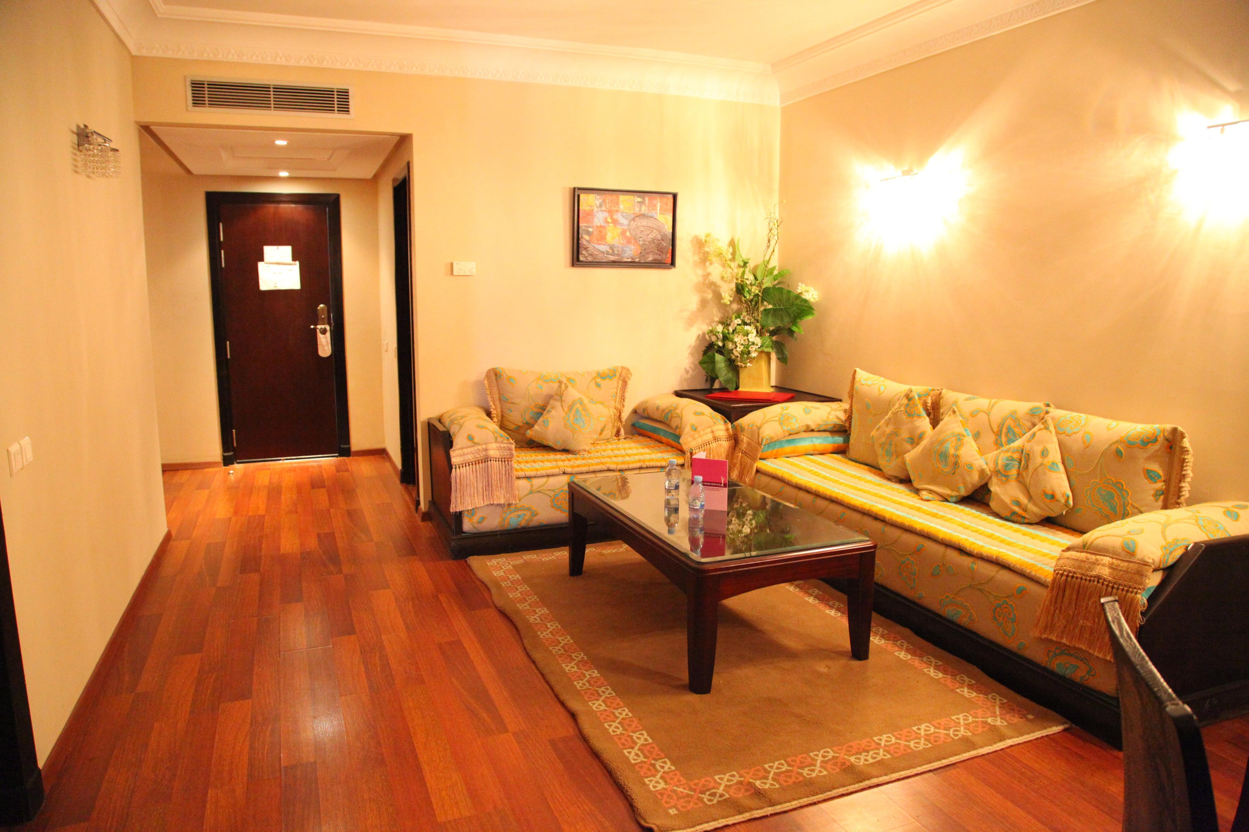 Palm Plaza Marrakech Hotel Marrakesh Exterior photo A living room in a suite at the Grand Hotel