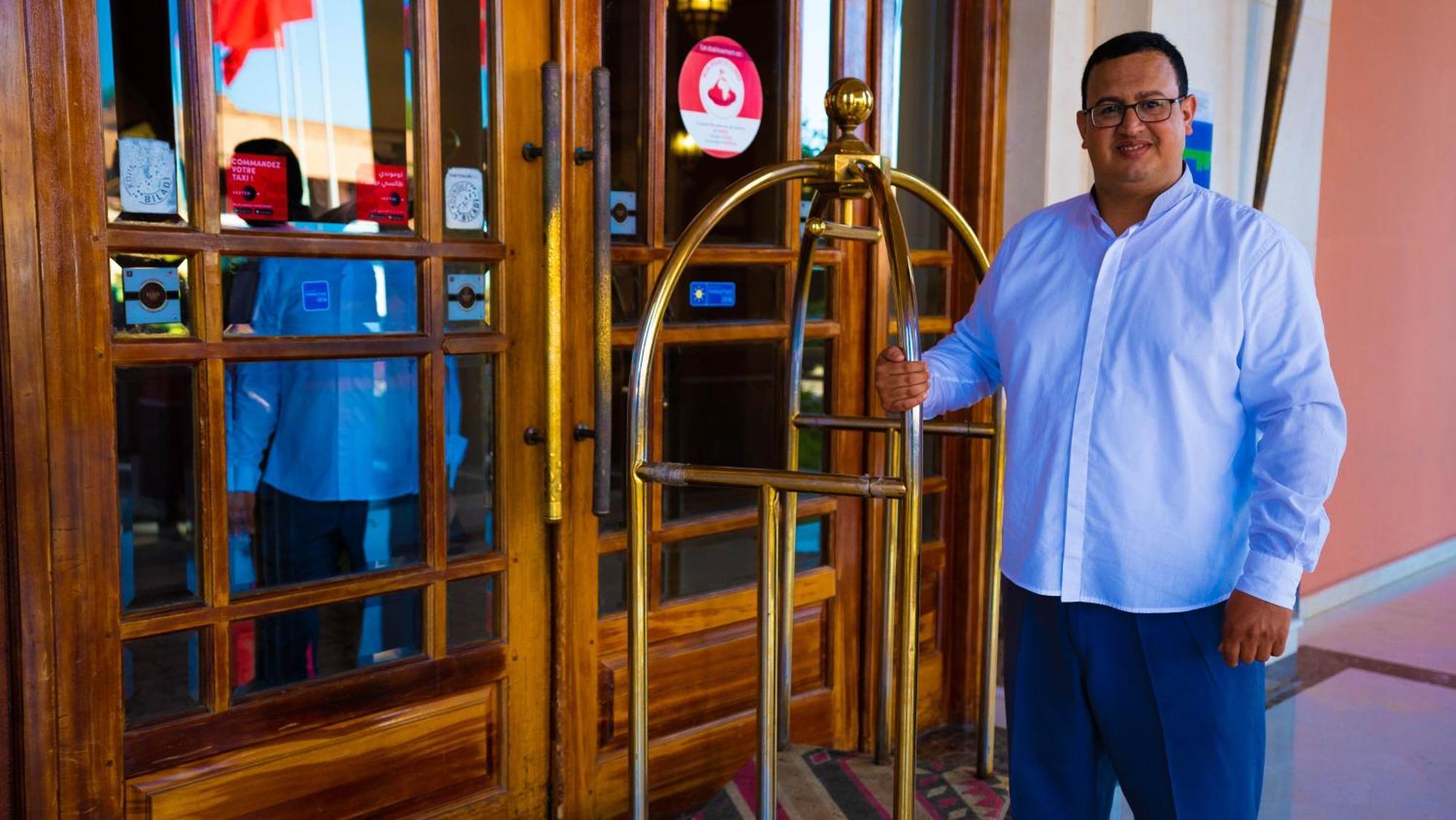 Palm Plaza Marrakech Hotel Marrakesh Exterior photo A bellboy at the entrance of a hotel